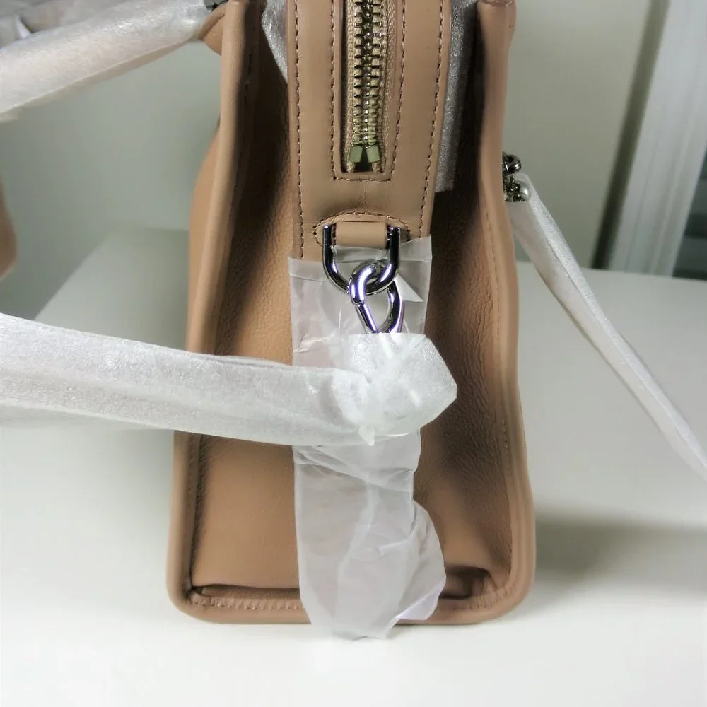 Rebecca Minkoff disclaimer color